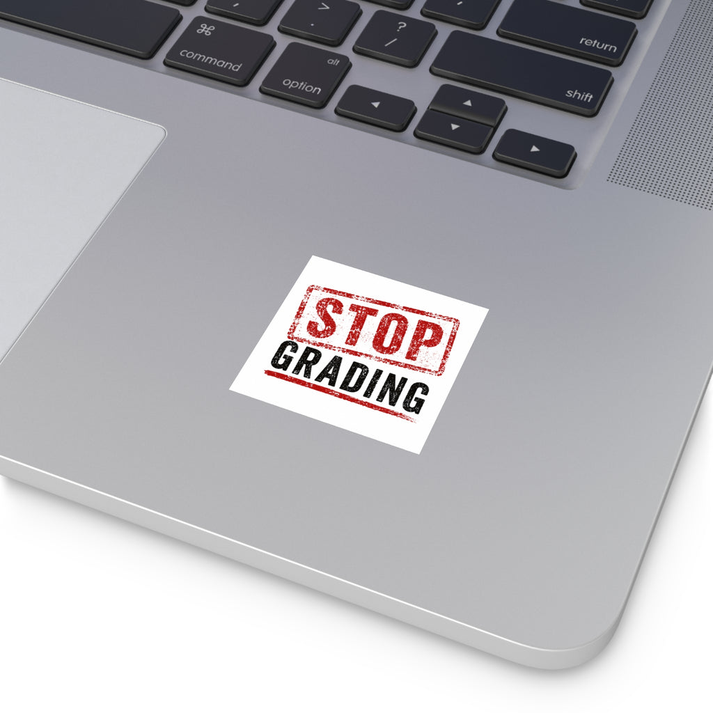 STOP GRADING stickers.