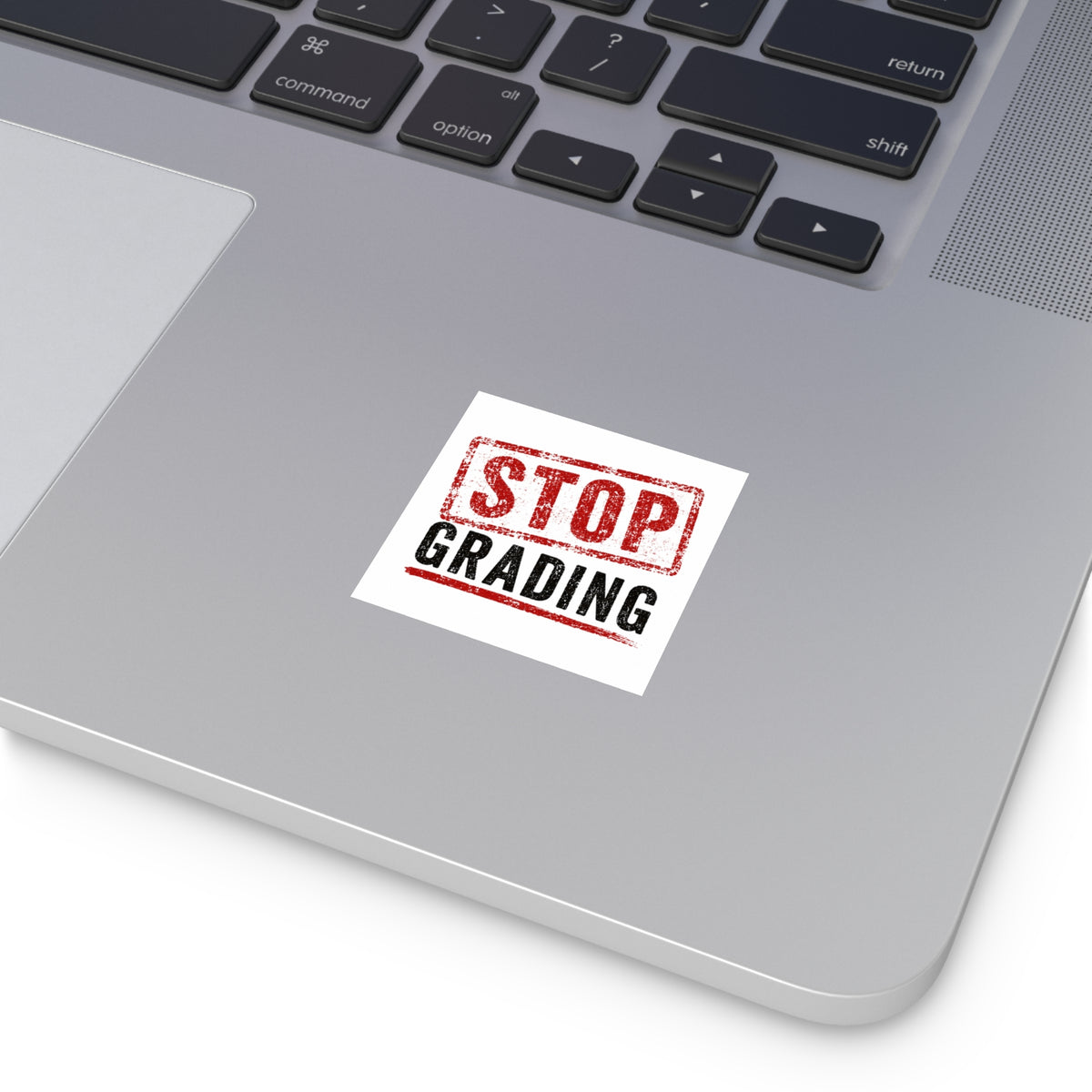 STOP GRADING stickers.